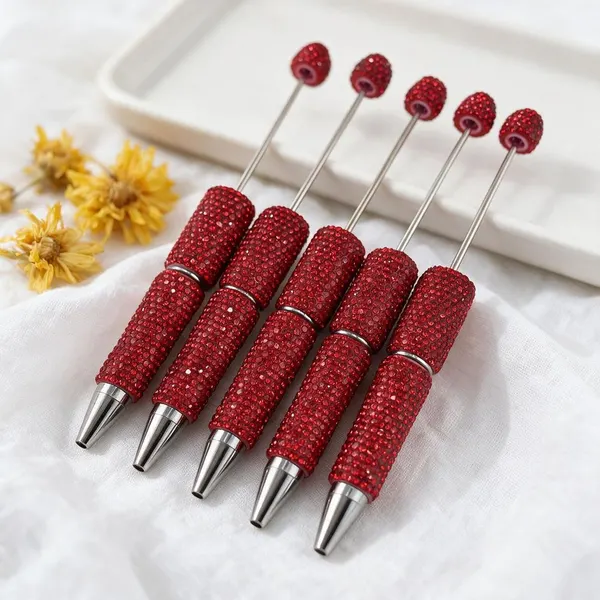 Pack de 5 Plumas con Cristales Rojos